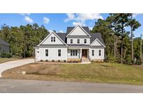 Two story home with gray siding and landscaping at 825 Crimson Rdg Trl, Fuquay Varina, NC 27526