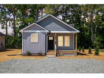 Newly constructed gray house with small front porch at 1849 N Main St, Roxboro, NC 27573