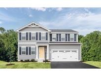 Two-story home with gray siding, yellow door, and white garage at 248 Gianna Dr, Lillington, NC 27546