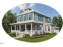 Two-story craftsman style home with front porch and attached garage at Lot C N King Ave, Dunn, NC 28334
