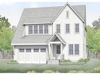 Two story home with white siding, a two car garage and landscaping at 1725 Birdhaven Ln, Wendell, NC 27591