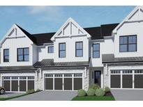 Modern farmhouse style townhome with two-car garage at 4038 Elk Creek Ln # 60, Raleigh, NC 27612