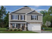 Two-story home with stone and siding exterior, two-car garage and landscaping at 6421 Alfalfa Ln, Wake Forest, NC 27587