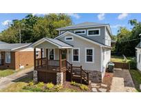Two-story craftsman home with a front porch and landscaped yard at 605 Quarry St, Raleigh, NC 27601