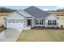 Two-story home with stone and siding exterior at 1491 Pecan Dr # Model Home, Nashville, NC 27856
