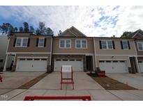 Available townhome with attached garage and paved driveway at 7112 Hubner Pl # 41, Cary, NC 27519