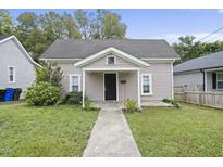Charming house with a front porch and walkway at 204 W Hill St, Benson, NC 27504
