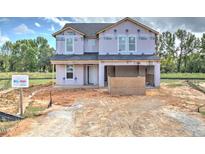 Two story house under construction with new roofing and siding at 55 Marley Dr, Dunn, NC 28334