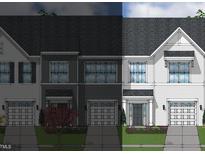 Three-unit townhouse building exterior elevation at 33 Pansy Park # 231, Clayton, NC 27520