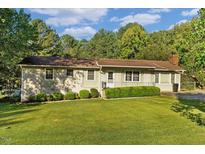 Charming ranch home with well-maintained lawn at 2063 Knight St, Creedmoor, NC 27522