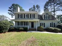 Two story house with a large front yard at 27 Pine Croft Rd, Angier, NC 27501