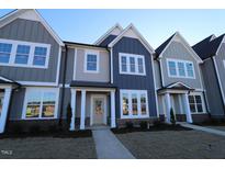 New construction townhome with charming exterior and inviting curb appeal at 3181 Mission Olive Pl # 346, New Hill, NC 27562