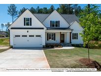 Stunning two-story home with a charming front porch at 775 Vick Rd, Spring Hope, NC 27882