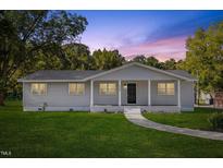 Newly renovated single story home with front porch at 712 Blount St, Smithfield, NC 27577