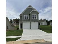 Two story home with gray siding and two car garage at 87 Furley St., Homesite 112, Sanford, NC 27330