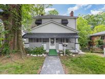 Two-story house featuring a front porch and walkway at 415 N Hyde Park Ave, Durham, NC 27703