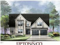 Two-story home with a large front porch and a three-car garage at 2603 Grant Ave, Raleigh, NC 27608