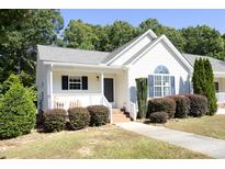 Charming one-story home with a welcoming front porch at 3632 E Cotton Gin Dr, Clayton, NC 27527