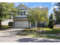Two story home with attached garage and landscaping at 517 Birchrun Dr, Durham, NC 27712