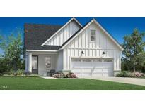 Two-story farmhouse style home with attached garage at 502 Gainer Dr # 2, Raleigh, NC 27610