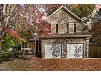 Two-story house with stone and siding exterior at 1412 Hanford Hills Rd, Graham, NC 27253