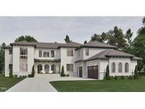 Modern two-story home with white siding and brown accents at 211 Reynolds Rd, Raleigh, NC 27609