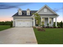 Gray two-story house with a two car garage and front porch at 53 Macy Cir, Wendell, NC 27591
