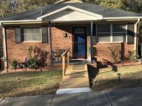 Brick ranch house with a ramp and landscaping at 308 E East End Ave, Durham, NC 27703