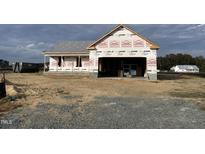 New house under construction, front view, showing the garage and landscaping at 31 Silver Ct, Smithfield, NC 27577