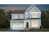 Two-story home with modern exterior and garage at 257 Circle City Way, Pittsboro, NC 27312