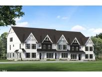 Three-unit modern farmhouse-style townhome building with dark roofing and landscaping at 901 Myers Point Dr # 17, Morrisville, NC 27560