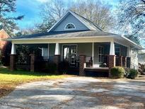 Charming craftsman style home with a welcoming front porch at 202 Delacroix St, Oxford, NC 27565