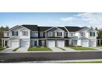 Exterior view of three townhouses with garages at 120 Parker Ln, Mebane, NC 27302