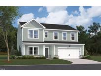 Two-story home with gray siding, white trim, and a two-car garage at 1216 Dimaggio Dr # 29, Raleigh, NC 27616