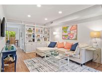 Spacious living room with built-in shelving and comfortable seating at 3738 Yorktown Pl, Raleigh, NC 27609