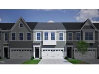 New townhome community with inviting curb appeal and attached garages at 190 Nimble Way # 218, Clayton, NC 27520