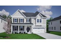 Two-story house with gray siding, a two-car garage, and a covered porch at 215 Augusta Pond Way # 156, Raleigh, NC 27603