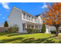 Two-story house with gray siding, landscaping, and a two-car garage at 102 Redstone Dr, Gibsonville, NC 27249