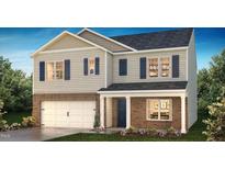 Two-story home with brick and siding exterior, two-car garage, and landscaping at 1203 Caledon Drive Dr # 195, Mebane, NC 27302