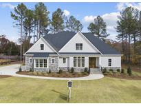Stunning two-story home with stone accents and a large front yard at 2637 Trifle Ln, Wake Forest, NC 27587