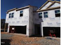 New construction home with vinyl siding and a two-car garage at 7135 Hubner Pl # 28, Cary, NC 27519