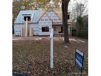 New house under construction, showing framing and exterior wrap at 4804 Deerwood Dr, Raleigh, NC 27529
