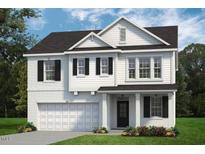 Two-story home with white siding, black windows, and a two-car garage at 8749 Maxine St # 11 Holly, Willow Springs, NC 27592