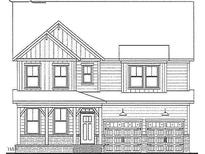 Two-story home with a two-car garage and front porch at 321 Highland Ridge Ln, Knightdale, NC 27545