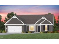 One-story Craftsman home with gray siding, white trim, and a two-car garage at 2330 Del Webb Gardens Dr, Fuquay Varina, NC 27526