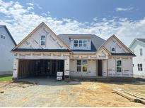 Two-story house under construction with a two-car garage at 2406 Terri Creek Dr # 58, Fuquay Varina, NC 27526