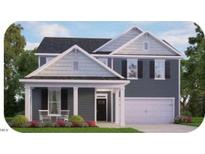 Two-story house with gray siding, white trim, and a two-car garage at 7525 Percussion Dr, Apex, NC 27539