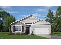 Craftsman style home with stone accents and a two-car garage at 40 Saddle Mare St, Clayton, NC 27520