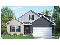 Two-story home with gray siding, brick accents, and a two-car garage at 7556 Percussion Dr, Apex, NC 27539
