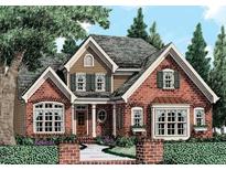 Brick two-story home with a classic design and landscaped front yard at 6464 Guess Rd, Durham, NC 27712